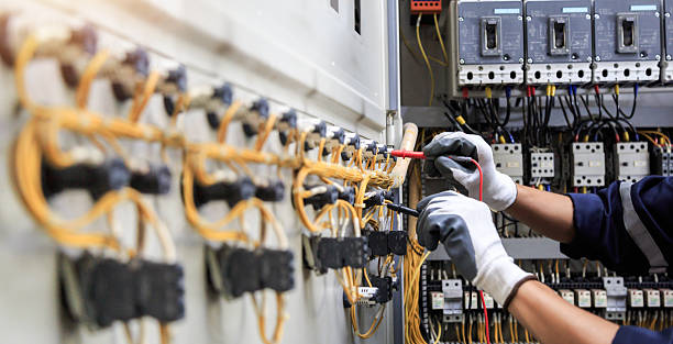 Professional Electrician technician working in Springmont, PA